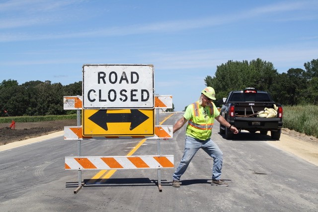 Road_Closed_Sign_Being_Pulled